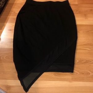 Tight Black Skirt with One Longer Mesh Side